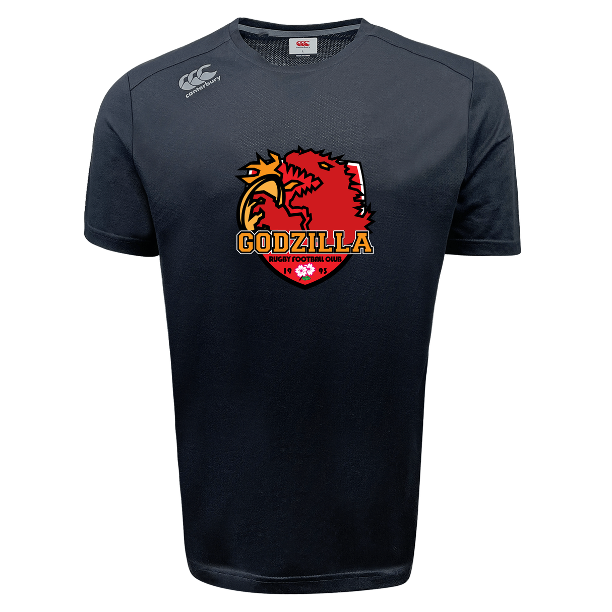 Introducing the Godzilla Rugby Football Club Tempo Vapodri T-Shirt by Canterbury—a black sports tee from WRS Canterbury featuring a bold red and yellow Godzilla logo with “Godzilla Rugby Football Club” text on the front, a discreet Canterbury logo on the shoulder, and advanced Vapodri moisture-wicking technology to keep you comfortable—ideal for any rugby fan.