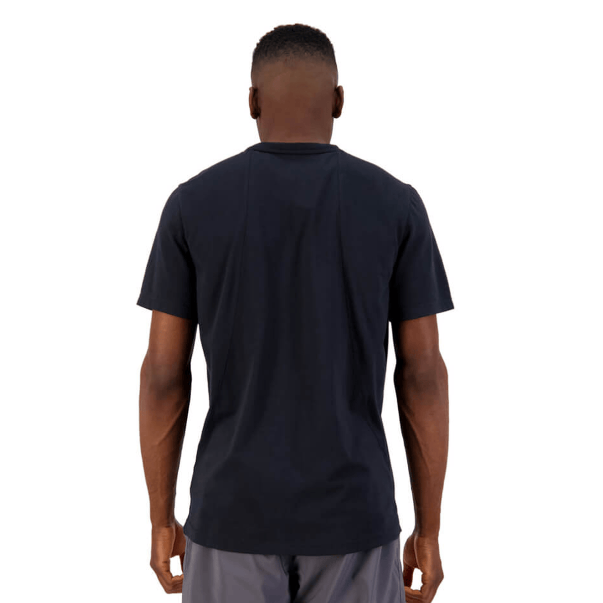 The back view of a man wearing a Canterbury Tempo Vapodri Tee.