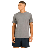 A man wearing a grey Canterbury Tempo Vapodri T-shirt and shorts.