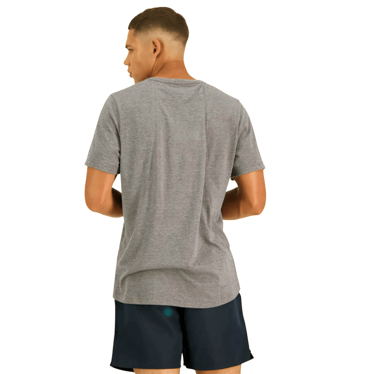 The back view of a man wearing Canterbury Tempo Vapodri T-shirt in grey.