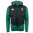 The Ireland 25/26 Hybrid Padded Jacket by Canterbury is a green and black hooded jacket with ThermoReg warmth, featuring the Canterbury logo on the right chest and IRFU crest on the left.