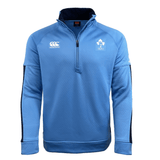The Ireland Rugby 1/2 Zip Training Top by Canterbury is a light blue, long-sleeve top featuring Canterbury’s ThermoReg technology, the Canterbury logo on the right chest, and the IRFU emblem on the left chest, designed with a half-zip.