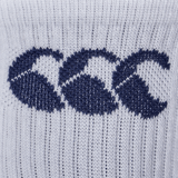 Close-up of a white cotton-rich Canterbury 3 Pack Crew Sock knitted fabric with three blue crescent-shaped designs.
