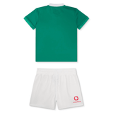 The Infant Ireland 24 Home Pack by Canterbury, featuring a green sports jersey with a white shorts set and striking red logo on the back, is perfect for young Irish Rugby fans.
