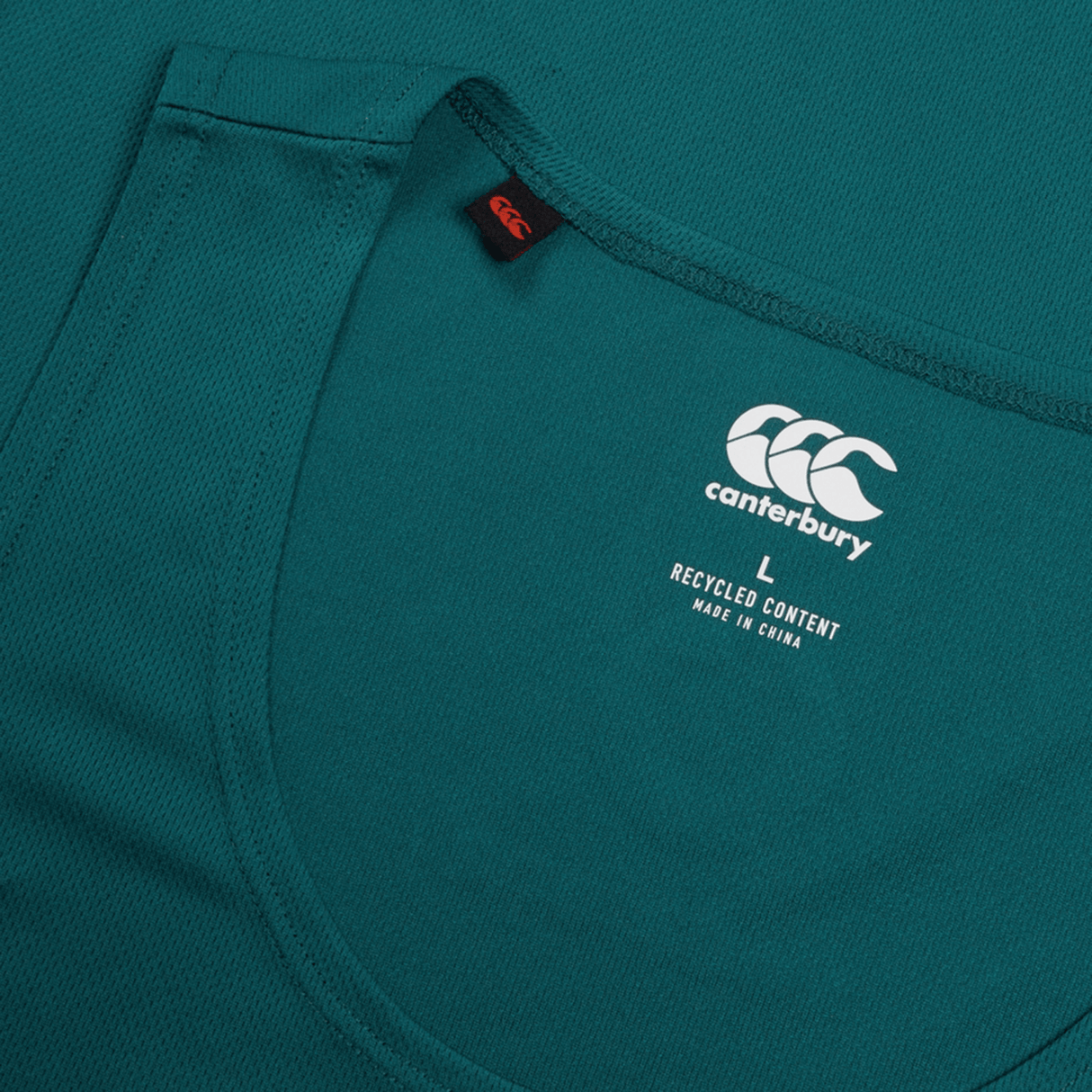 Ireland 24 Poly Training Singlet by Canterbury in green, featuring quick-drying fabric. Size large with a "recycled content made in China" label inside the neckline.