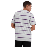A person wearing a Canterbury Yarn Dye T-Shirt by Canterbury with purple stripes and black pants is shown from the back, standing against a white background.