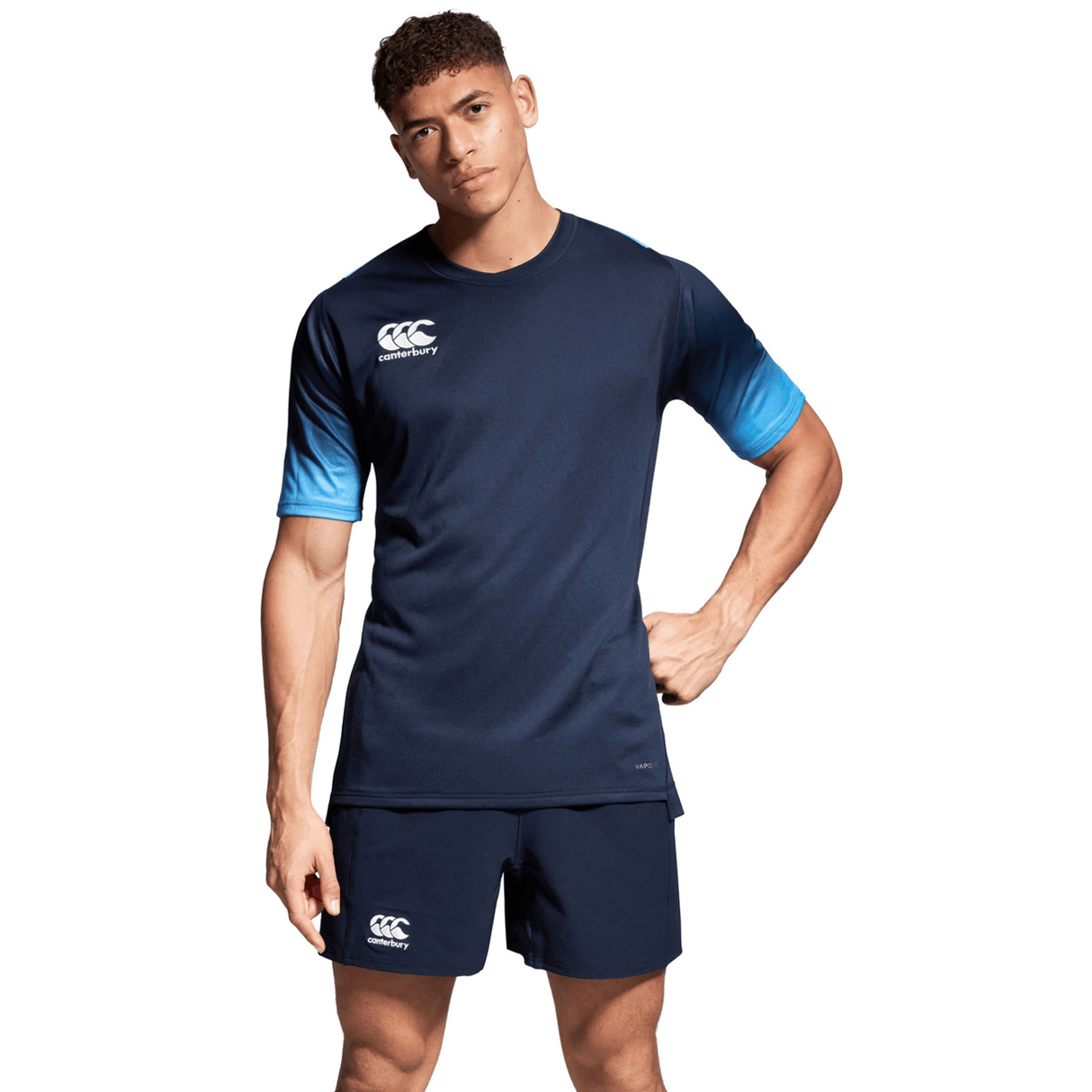 A man in a Canterbury rugby jersey posing for a picture wearing the Canterbury Yokohama Short.
