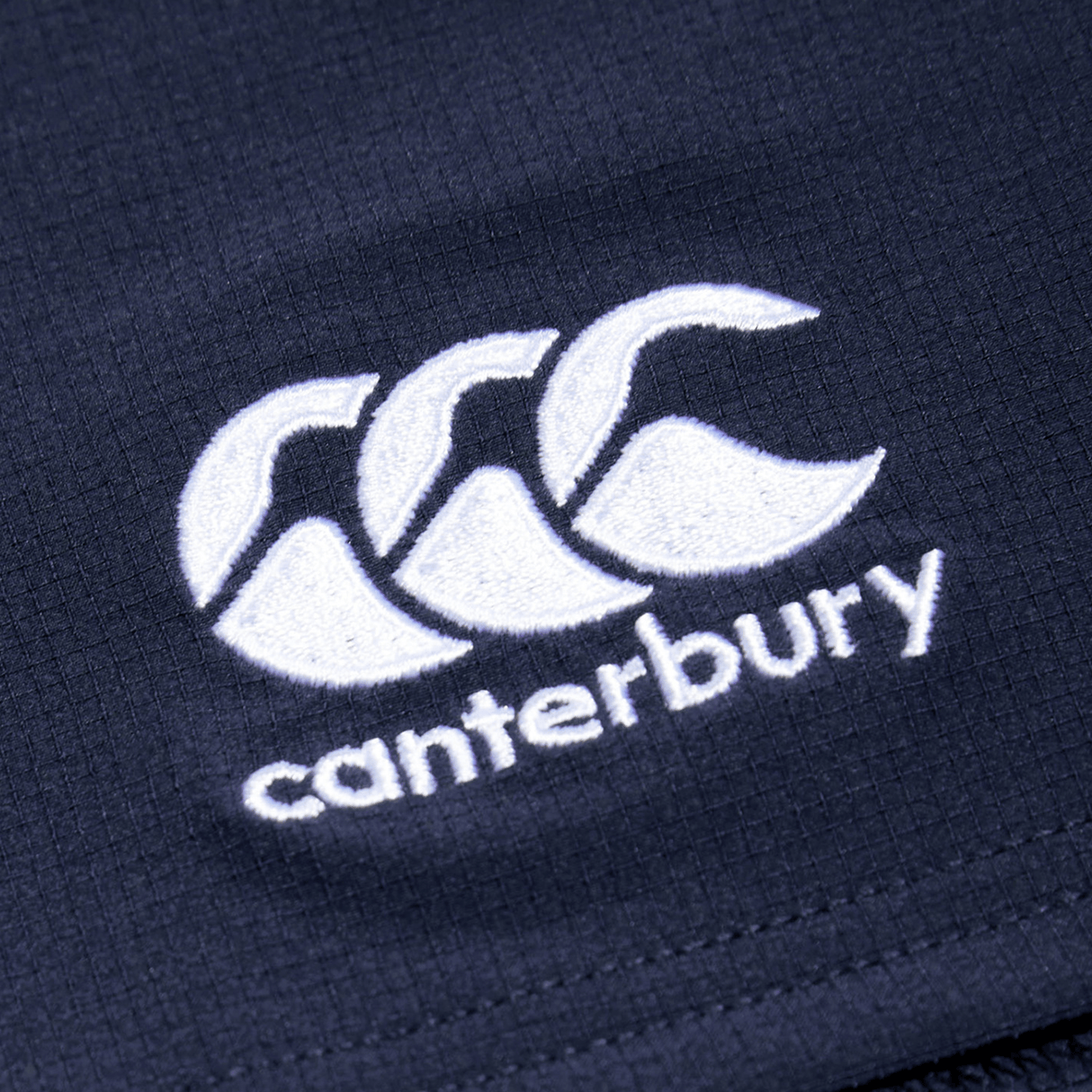 A picture of the Canterbury logo on a Canterbury Yokohama Short.