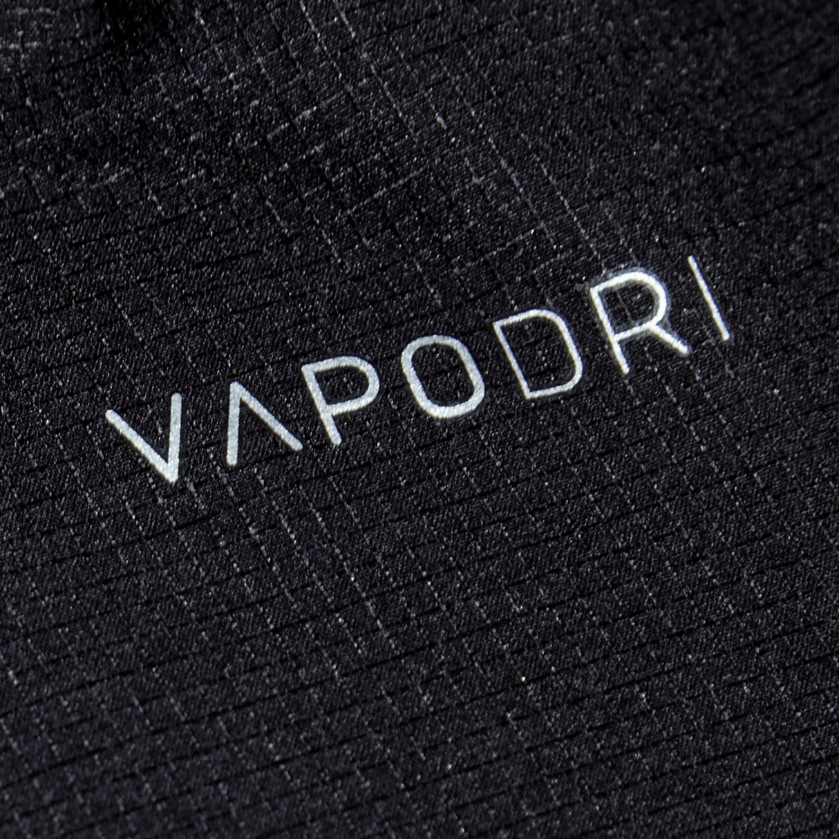 Close-up of durable black fabric from the Women's Canterbury Yokohama Short 3-Pack Bundle by Bundle Canterbury, featuring "VAPODRI" in white text.
