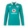 The Women's Ireland 25/26 Long Sleeve Classic Home Jersey by Canterbury features a green design with white collar, IRFU and Canterbury logos, Vodafone sponsor, and advanced VapoDri fabric for comfort and performance.