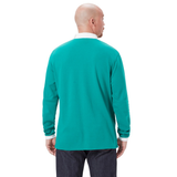 A bald man wears the Ireland 25/26 Long Sleeve Classic Home Jersey by Canterbury, featuring a teal design with white collar and cuffs. His back is to the camera against a plain white background.