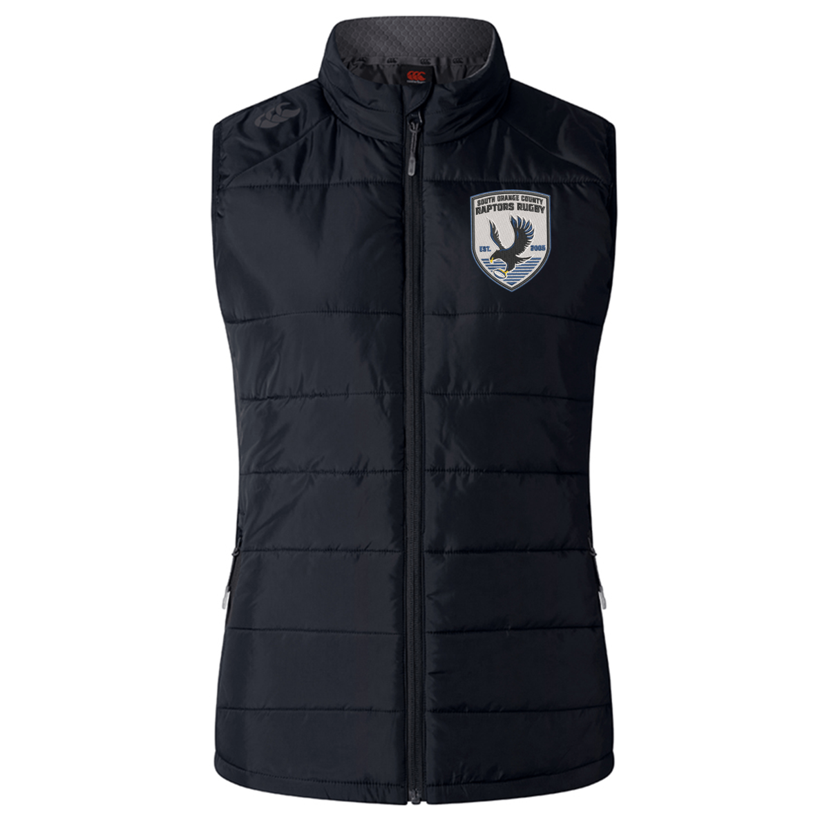 EMB Canterbury South Orange County Raptors Women’s Elite Microlite Gilet by Canterbury – a black, sleeveless, quilted insulated vest featuring a front zipper, two side pockets, and a patch with an eagle and text on the left chest.