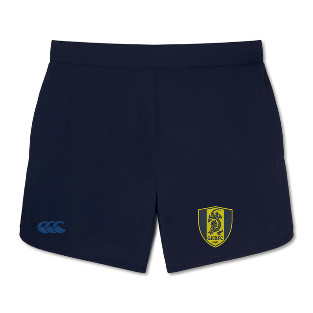 The Gotham Knights Women's Elite Woven Short by Canterbury from EMB Canterbury features a navy blue design with a yellow and black lion crest on the right leg and a blue logo on the left leg, making it perfect for training sessions.