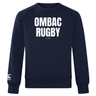 The OMBAC Rugby Club Crew Sweatshirt by WRS Canterbury is an ultra-soft navy blue garment featuring "OMBAC RUGBY Est 1966" printed in white on the chest and an embroidered CCC logo on the left sleeve, offering both style and comfort.