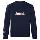 The USA Para Powerlifting Club Crew Sweatshirt by WRS Canterbury features “USA PARA POWERLIFTING” and a barbell graphic on navy blue, with a CCC logo on the sleeve in classic Canterbury style.