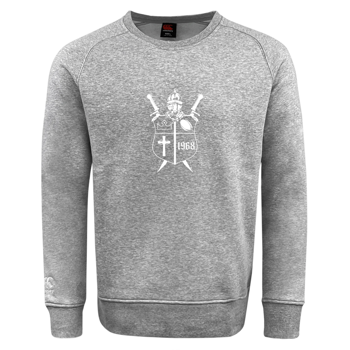 Ultra soft grey Cal Lutheran University Club Crew Sweatshirt by Canterbury featuring a white graphic of a crest with a knight’s helmet, two swords, a cross, and the year 1968.