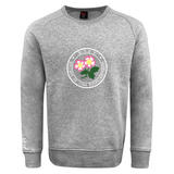 The Society of Iowa Rugby Referees Club Crew Sweatshirt by Canterbury from WRS Canterbury is a gray crew sweatshirt with an ultra-soft feel, featuring a circular emblem adorned with pink flowers and green leaves labeled “Society of Iowa Rugby Referees,” and finished with an embroidered CCC logo for a classic touch.