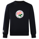 Stay cozy in the Society of Iowa Rugby Referees Club Crew Sweatshirt by Canterbury—a black ultra-soft sweatshirt from WRS Canterbury, featuring the Society of Iowa Rugby Referees logo with pink flowers on the chest and an embroidered CCC logo on the left sleeve, ideal for any Canterbury fan.