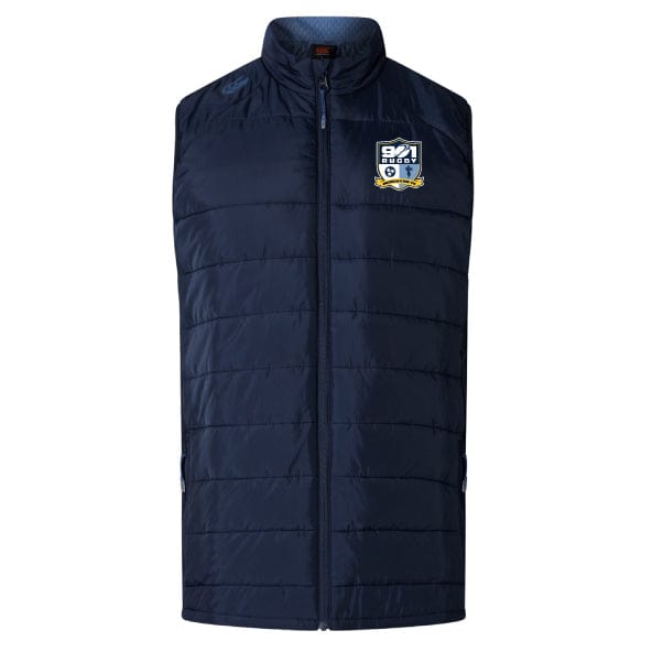Introducing the 901 Rugby Women's Elite Microlite Gilet by EMB Canterbury, a navy blue quilted vest equipped with Thermoreg technology. This stylish gilet features a high collar and front zipper, designed with insulated baffles and proudly showcasing the EMB Canterbury logo on the upper left chest.
