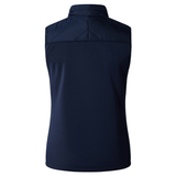 The Women's Canterbury Elite Microlite Gilet is shown in navy blue from the back, with quilted detailing and a stand-up collar. This sleeveless vest features insulated baffles for optimal Thermoreg performance.