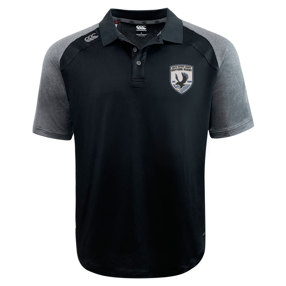 Introducing the South Orange County Raptors Elite Polo by EMB Canterbury—a black and gray short-sleeve polo shirt expertly crafted from Vapodri fabrics for enhanced breathability. This lightweight polo features a bird-themed embroidered Raptors patch on the left chest and a subtle EMB Canterbury logo near the right shoulder. Combining superior comfort and style, it’s ideal for everyday wear.