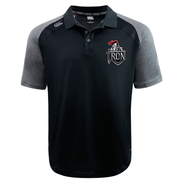 The Birmingham Iron Women's Football Elite Polo by EMB Canterbury features black and gray Vapodri fabric, a collar, branded logo on the left chest, and a small logo on the right shoulder.