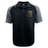 The Spartan Youth Rugby Elite Polo by EMB Canterbury features lightweight Vapodri fabric, a "Spartan Football" logo on the left chest, and Canterbury branding on the right chest and left shoulder. Black and gray color scheme.