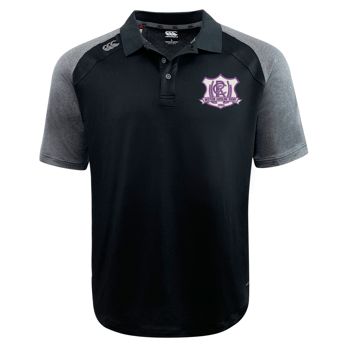 Western Carolina University Elite Polo by Canterbury in black with grey raglan sleeves and a Western Carolina Rugby emblem on the left chest.