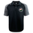 The Society of Iowa Rugby Referees Elite Polo by EMB Canterbury is a black and gray short-sleeve shirt crafted with Vapodri fabrics for lightweight durability. It features a floral emblem on the left chest and a small Canterbury logo on the right shoulder, shown against a white background.