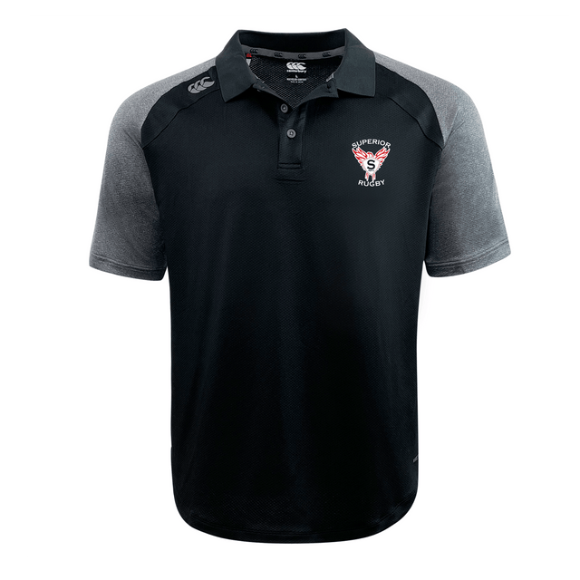 The Superior Rugby Club Elite Polo by EMB Canterbury is a black and grey short-sleeve rugby shirt with moisture-wicking Vapodri fabric, "Superior Rugby" logo on the left chest, and Canterbury logo on the right shoulder.