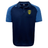 The Gotham Knights Elite Polo by Canterbury from EMB Canterbury features a navy blue and light blue design, short sleeves, a logo on the left chest, and is crafted from lightweight, moisture-wicking Vapodri fabrics.