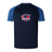 The Nebraska Rugby Referee Society Elite Training Tee by WRS Canterbury is a navy short-sleeve athletic shirt made with Vapodri fabric, featuring the Nebraska Rugby Referee Society logo and contrasting blue sleeves—lightweight, durable, and perfect for training.