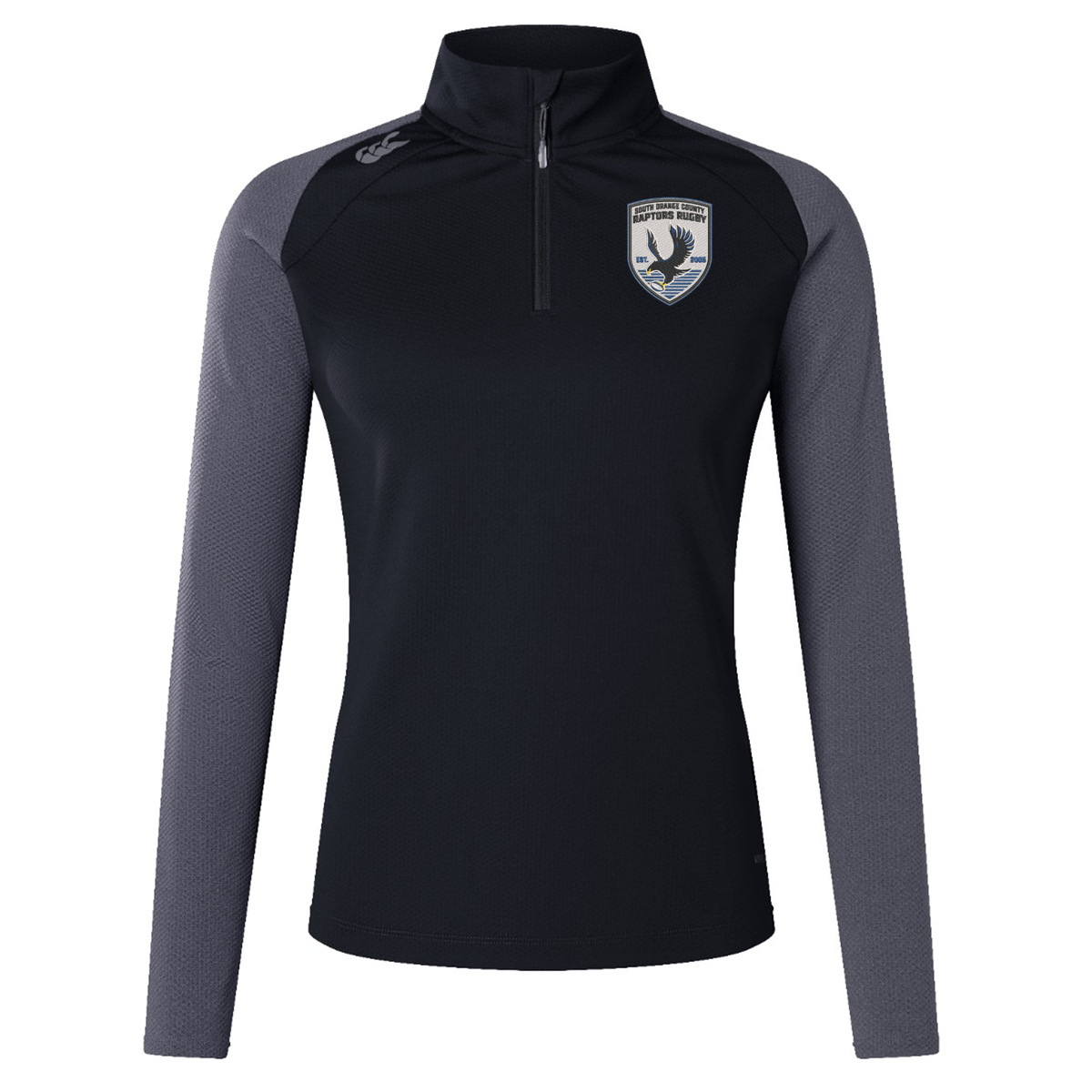 The South Orange County Raptors Women’s Elite First Layer by EMB Canterbury is a black and gray long-sleeve athletic top featuring a quarter-zip design and an embroidered bird crest on the left chest. Crafted with VapoDri technology for superior moisture-wicking performance, this women’s first layer by Canterbury is displayed against a plain white background.