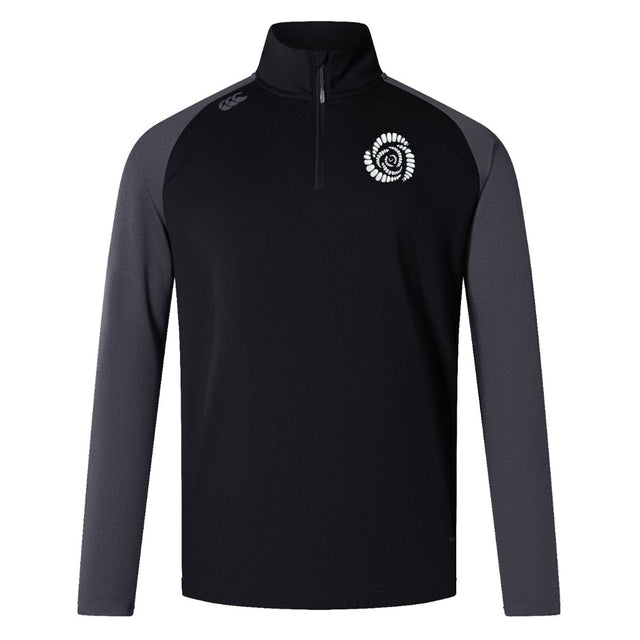 The Missoula All-Maggots Elite First Layer by EMB Canterbury is a black and gray long-sleeve quarter-zip athletic pullover featuring a white circular logo on the left chest and a small logo on the right shoulder. Designed as a rugby training top, this Canterbury layer incorporates VapoDri technology to keep you cool and comfortable during intense workouts.