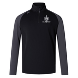 The Highlanders Rugby NC Elite First Layer by Canterbury, from EMB Canterbury, is a black and gray long-sleeve rugby jersey with a quarter-zip front featuring the 'Highlands Rugby' logo on the left chest. This jersey incorporates VapoDri technology for quick-drying comfort.