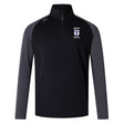The St. Augustine High School Women's Elite First Layer by EMB Canterbury is a black and gray long-sleeve athletic pullover made from moisture-wicking honeycomb fabric. It features a half-zip design and showcases the "Saints Rugby" logo on the left chest, integrating VapoDri technology for maximum comfort during intense workouts.