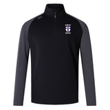 The St. Augustine High School Women's Elite First Layer by EMB Canterbury is a black and gray long-sleeve athletic pullover made from moisture-wicking honeycomb fabric. It features a half-zip design and showcases the "Saints Rugby" logo on the left chest, integrating VapoDri technology for maximum comfort during intense workouts.