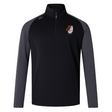 The Toa Rugby Idaho Women's Elite First Layer by EMB Canterbury, features VapoDri tech for comfort. This long-sleeve, black and gray pullover includes a quarter-zip, Canterbury logo near the collar, and a stylized mask emblem on the chest that blends style with performance.