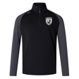 The South Orange County Raptors Elite First Layer by Canterbury is a black and dark gray long-sleeve rugby training top featuring a quarter zip, a crest with a bird emblem on the left chest, and a small Canterbury logo on the right shoulder. Crafted by EMB Canterbury as part of the Canterbury Elite First Layer collection, this pullover incorporates advanced VapoDri technology to keep you cool and comfortable during intense workouts.