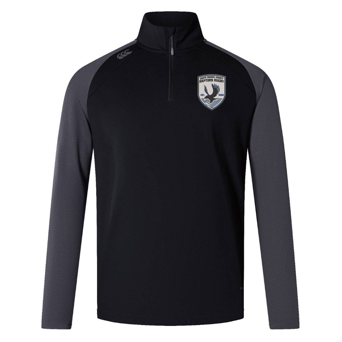 The South Orange County Raptors Elite First Layer by Canterbury is a black and dark gray long-sleeve rugby training top featuring a quarter zip, a crest with a bird emblem on the left chest, and a small Canterbury logo on the right shoulder. Crafted by EMB Canterbury as part of the Canterbury Elite First Layer collection, this pullover incorporates advanced VapoDri technology to keep you cool and comfortable during intense workouts.
