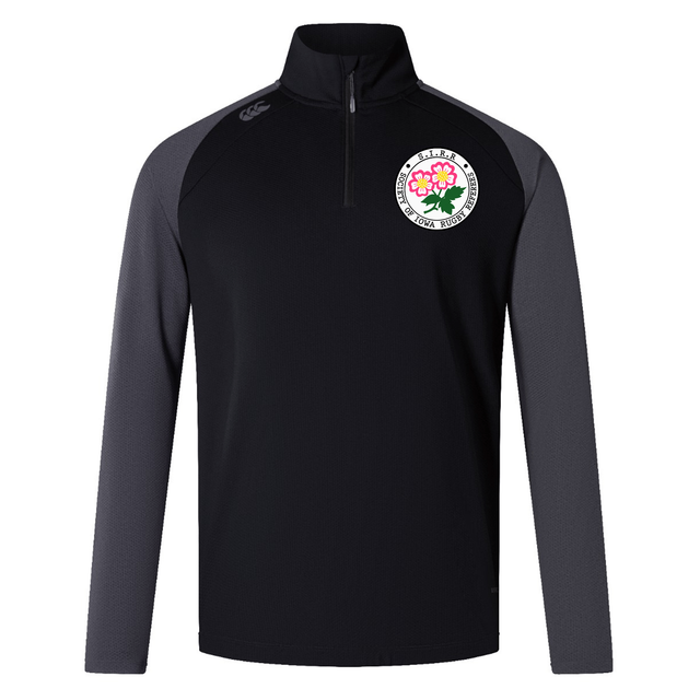 A long-sleeve black and dark gray EMB Canterbury Society of Iowa Rugby Referees Elite First Layer zip-up athletic top, designed with VapoDri technology for enhanced comfort during workouts, featuring a white and pink flower emblem on the left chest.