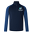 The EMB Canterbury NC Rugby Academy - Megalodons Elite First Layer is a navy and blue quarter-zip rugby top with the academy logo, a stylized shark on the left chest, and features advanced VapoDri technology for performance.