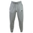 The Birmingham Steel Rugby Leisure Sweatpant by EMB Canterbury are gray sweatpants made from organic cotton, featuring a drawstring waist, a logo on the left thigh, and a small emblem on the right pocket area.