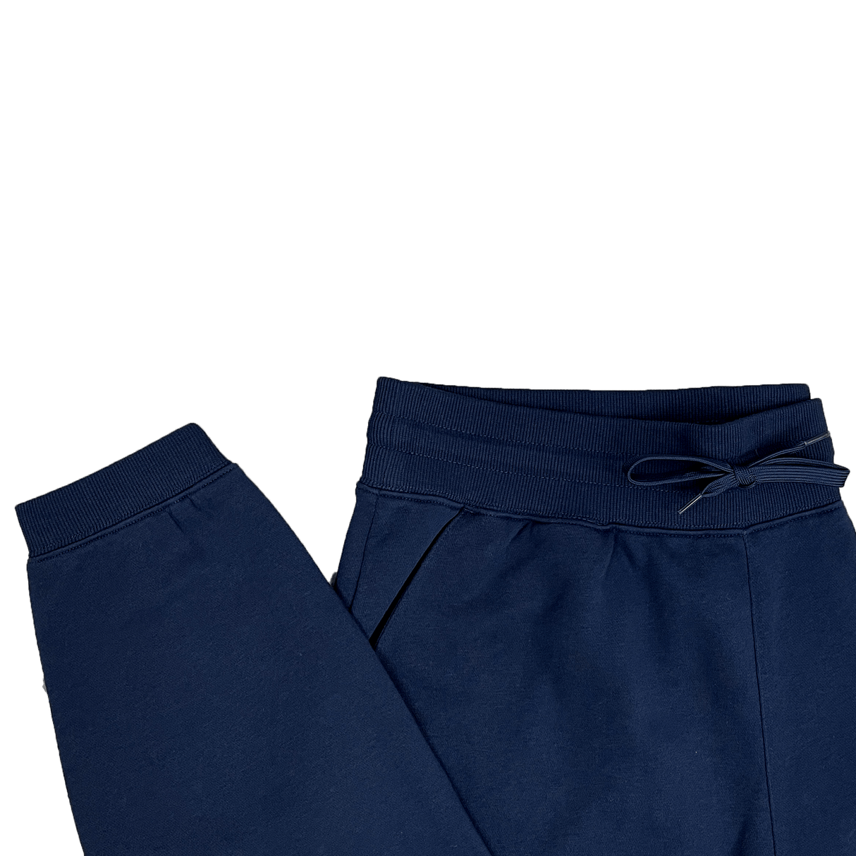 The Canterbury Leisure Sweatpant by Canterbury is available in navy blue, made from a sustainable blend of organic cotton. It highlights an elastic waistband, drawstring, and ribbed ankle cuffs. Displayed on a white background.