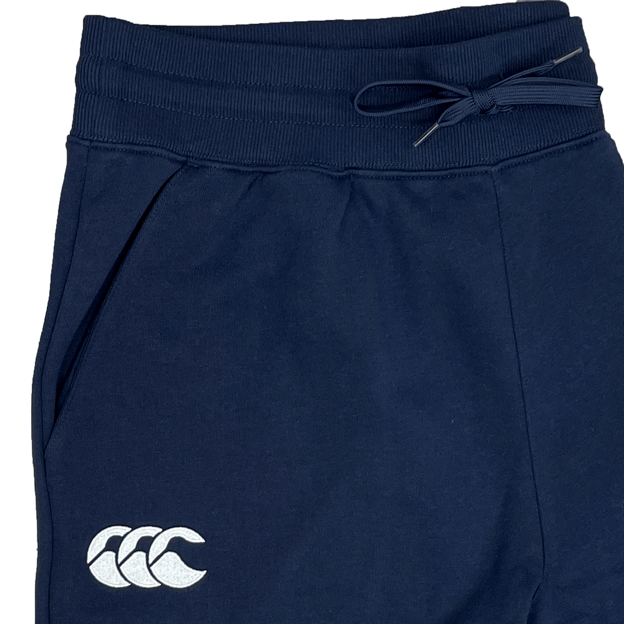 Canterbury Leisure Sweatpants in navy blue, crafted from an organic cotton and sustainable blend, featuring a white logo on the upper left thigh and a drawstring waistband.