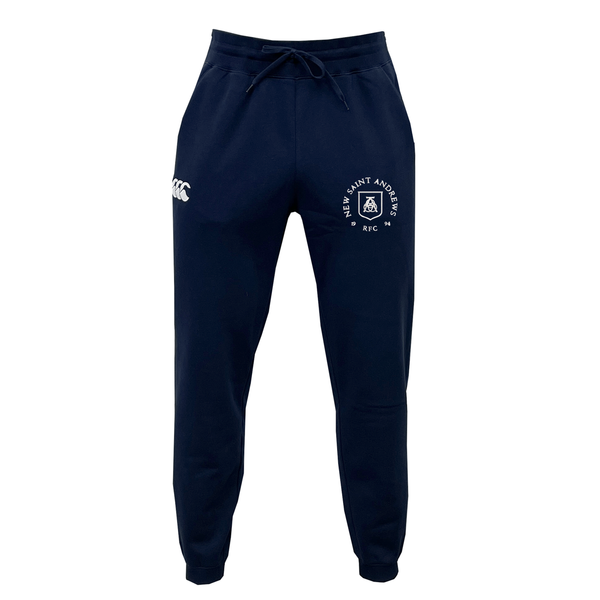 The New Saint Andrews College Leisure Sweatpant by EMB Canterbury features a navy blue design with a drawstring waist, side pockets, and two white printed logos on the left thigh and right hip. Crafted from soft recycled polyester fleece, these sweatpants offer both comfort and durability.