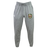 The RVA T.R.C. Leisure Sweatpant by EMB Canterbury features a gray organic cotton sweatpants fabric, complete with a drawstring waist, a white EMB Canterbury logo on the left thigh, and a vibrant RVA emblem on the right thigh, all showcased against a plain white background.