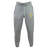 The Spartan Youth Rugby Leisure Sweatpant by EMB Canterbury features an elastic waistband, drawstring, and two embroidered logos (white on left thigh, yellow on right) in soft recycled polyester.