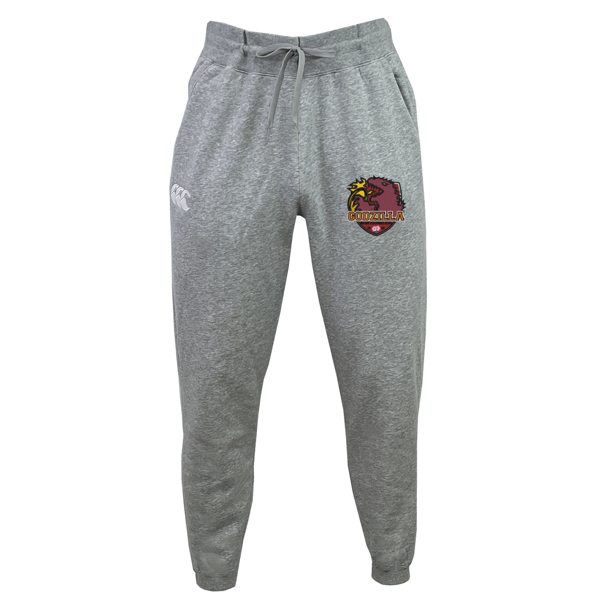 The Godzilla Rugby Football Club Leisure Sweatpant by EMB Canterbury features a gray sustainable design with a drawstring waist, convenient side pockets, a white Canterbury logo on the left leg, and a maroon and gold Eaglehawk emblem on the right thigh.