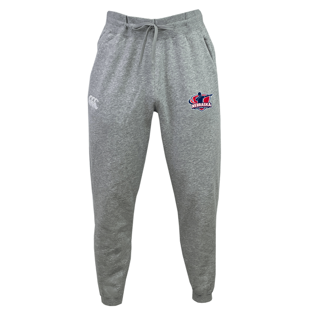 The Nebraska Rugby Referee Society Leisure Sweatpant by EMB Canterbury is a gray, sustainable sweatpant with a drawstring, featuring the Canterbury logo on the left and Nebraska rugby logo on the right thigh.
